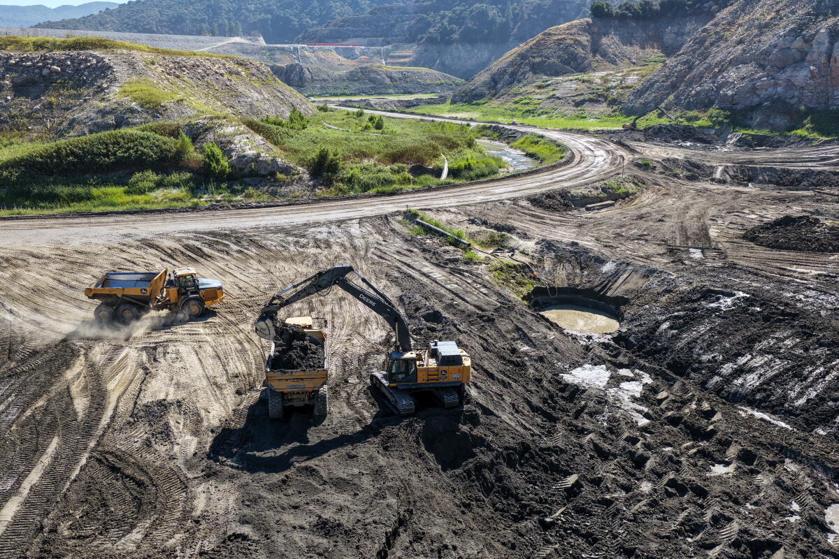 bulldozers on a slope