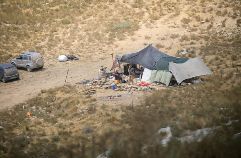 Jewish settler encampment, used for grazing, is located on Palestinian land in the Masoudiya area, northwest of Nablus in the West Bank. Jewish settlers attacked Palestinian homes, throwing stones and setting fire to farmland in the village of Deir Dibwan and the Masoudiya area. June 15, 2026.