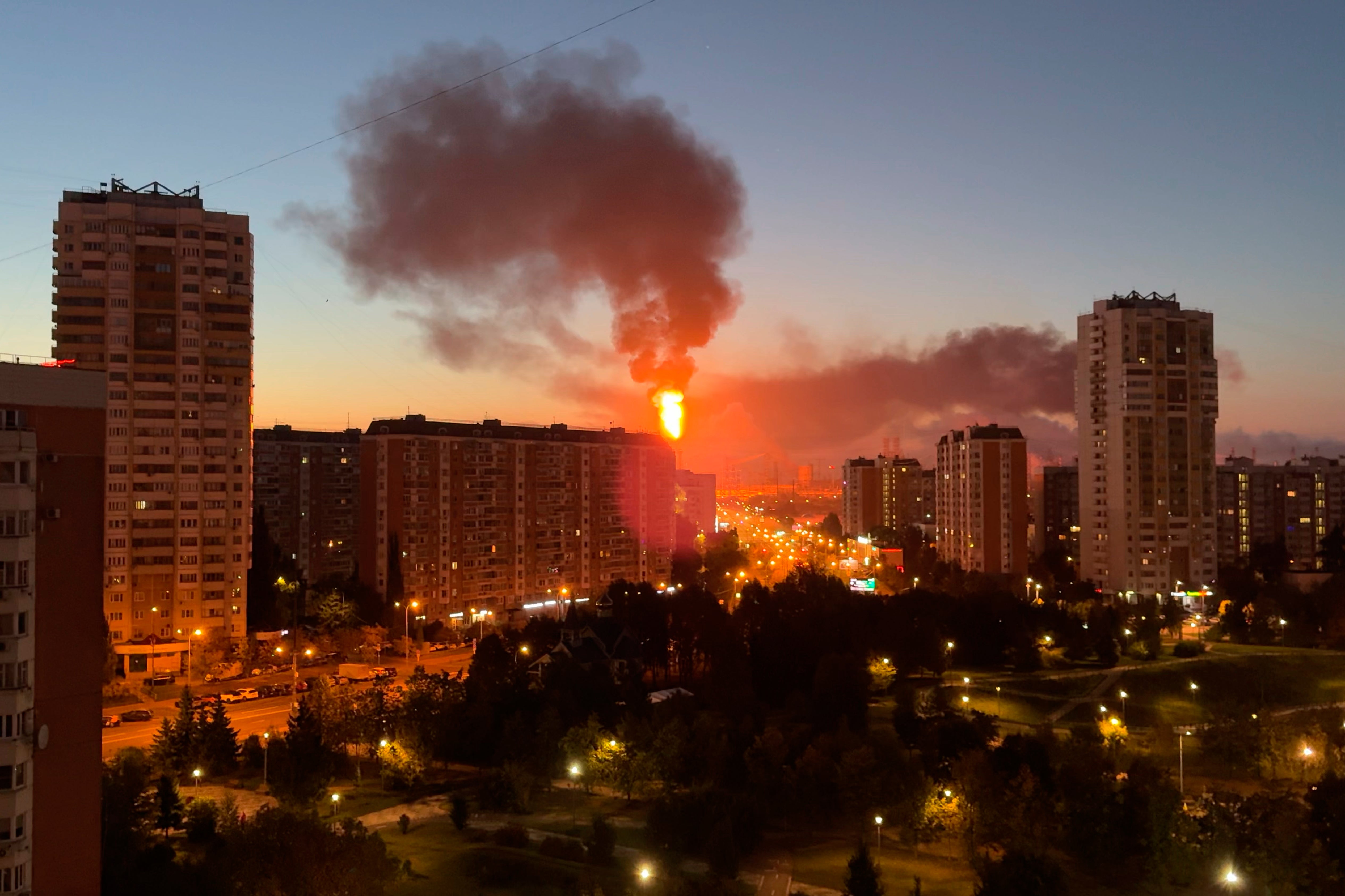 Flame and smoke is seen rising from Moscow's oil refinery in the south east of the city following a largescale Ukrainian drone attack, Sunday, September 20