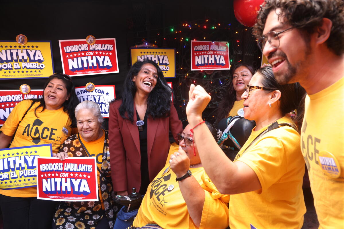 Nithya Raman surrounded by supporters