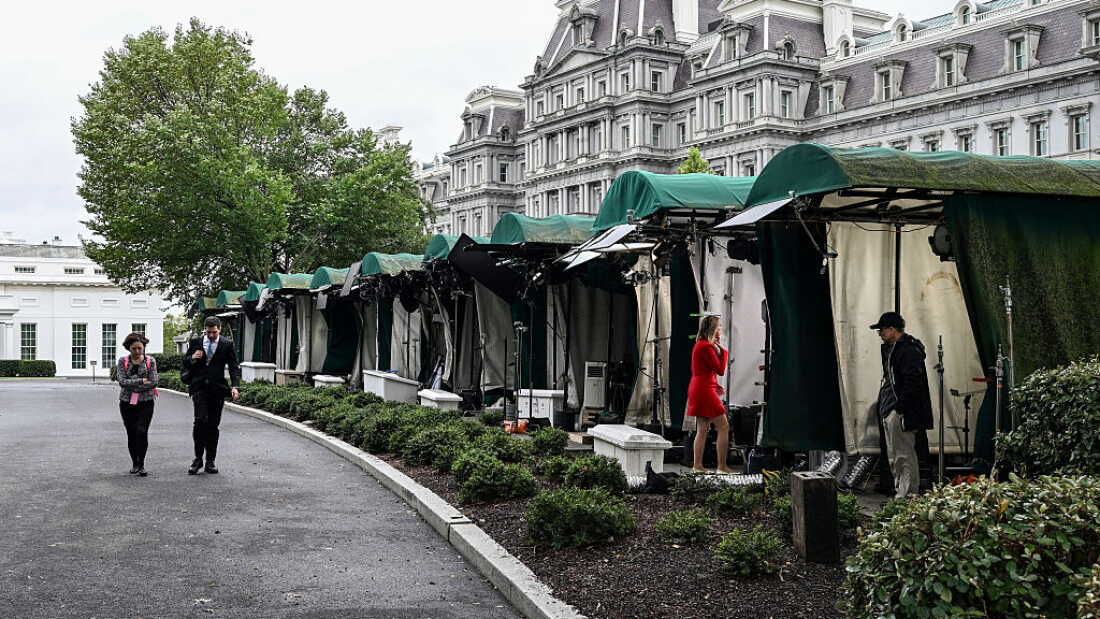 Broadcast news workspaces are seen outside the White House in Washington, D.C., on Wednesday.