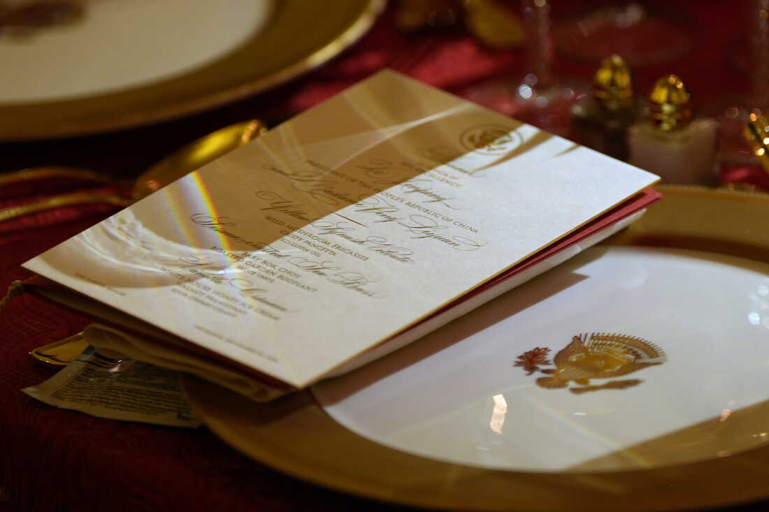 The menu is seen at a seat as President Donald Trump hosts a State Dinner for China's President Xi Jinping in the East Room of the White House, Thursday, Sept. 24, 2026, in Washington.