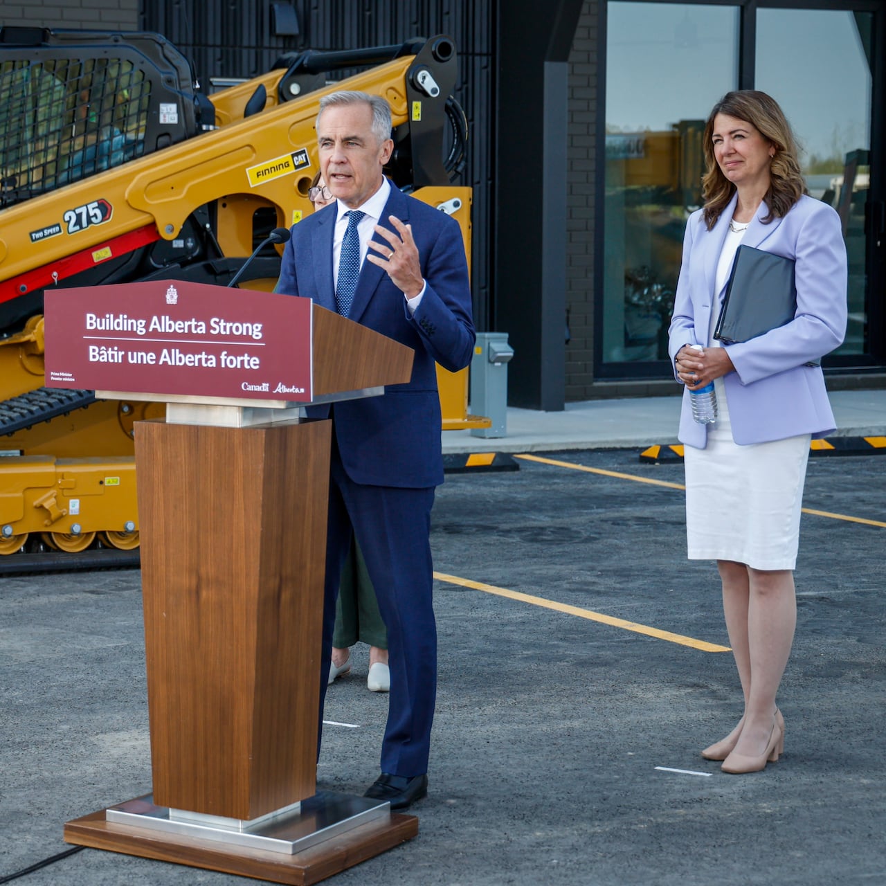Prime Minister Mark Carney and Alberta Premier Danielle Smith appear together in Red Deer, Alta