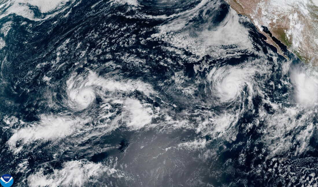 This satellite image from the National Oceanic and Atmospheric Administration (NOAA) shows Tropical Storm Nolo, left, south of Hawaii; Hurricane Odalys, middle, and Hurricane Polo, right, off the coast of Mexico, in the Pacific Ocean on Thursday, Sept. 24, 2026.