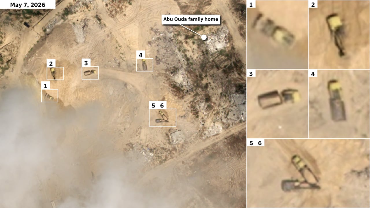 Satellite images shows vehicles clearing rubble.