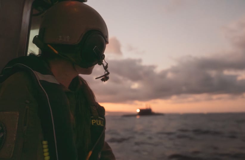 A soldier stands aboard an INS submarine in images released on September 24, 2026.