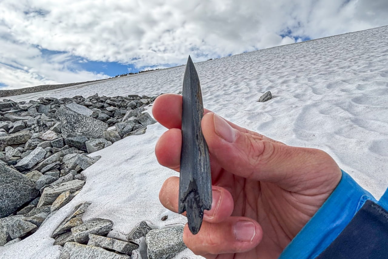 5,000-year-old arrow emerges as Norway&rsquo;s melting mountain ice reveals older archaeological finds