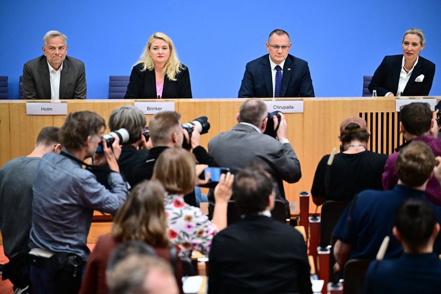 Several AfD members seated at the Federal Press Conference in Berlin on Monday. The party has sought to rebuff the Germany domestic intelligence agency's