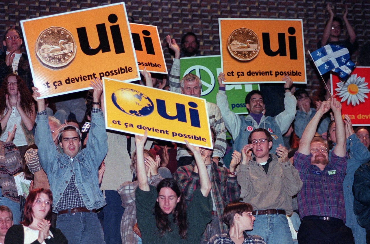 Yes supporters cheer during a speech by Bloc Quebecois Leader Lucien Bouchard