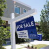 A for sale in front of a home in Miami.