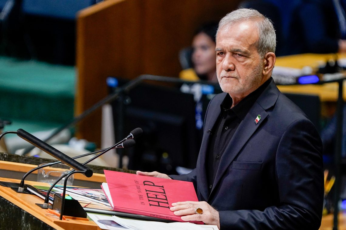 Sep. 23, 2026: Iranian President Masoud Pezeshkian holding a book entitled “In the name of HELP” as he addressed the United Nations General Assembly in New York.