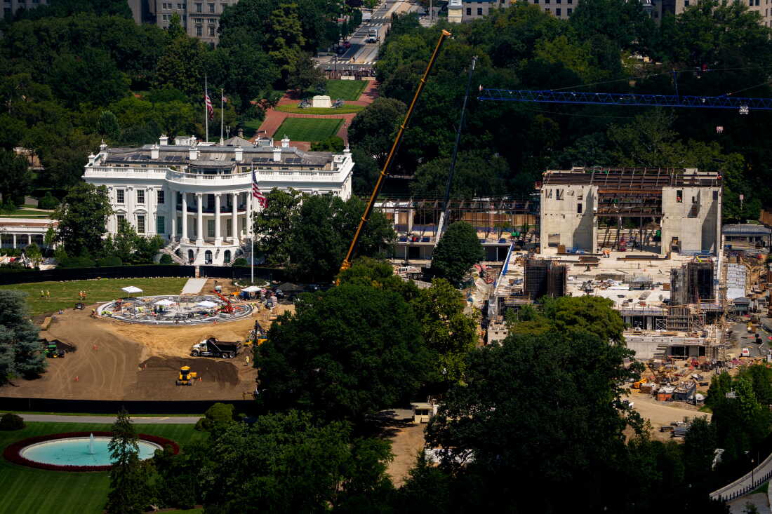 Side-by-side construction of a new helipad on the South Lawn of the White House and the East Wing ballroom, as seen in late August. 