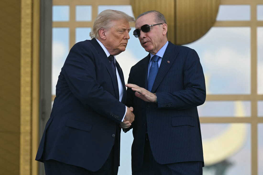 Turkish President Recep Tayyip Erdogan shakes hands with President Trump at Bestepe presidential compound in Ankara, Turkey, on the sidelines of a NATO summit, on July 7.
