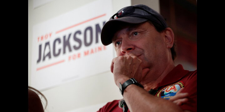 Democratic candidate for the U.S. Senate Troy Jackson listens as he is introduced at a campaign stop at the Supper Club Cocktail Lounge in Portland, Maine, U.S., August 19, 2026. REUTERS/Brian Snyder