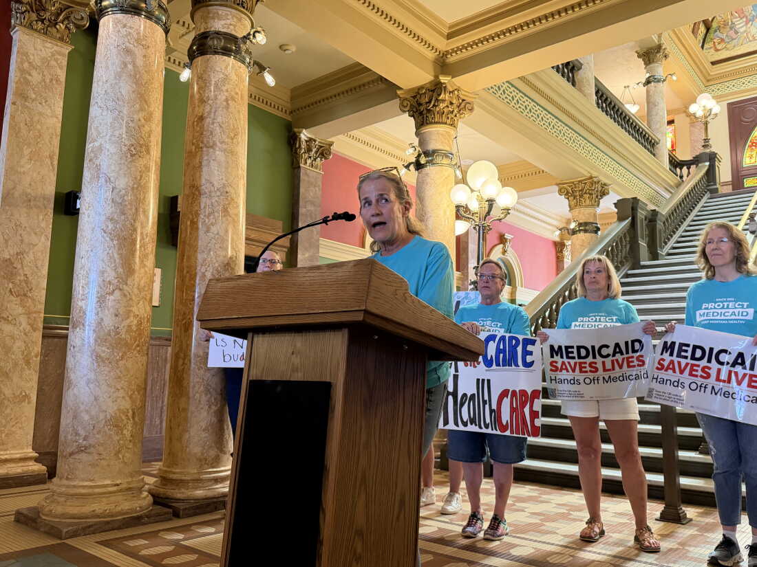 Rep. Mary Caferro, a Democrat in the Montana House, spoke at a rally in July at the Montana Capitol in Helena, criticizing the state’s expedited rollout of Medicaid work requirements. She’s among several Democrats who pushed for the state to delay implementing the rules until the Jan. 1 federal deadline.
