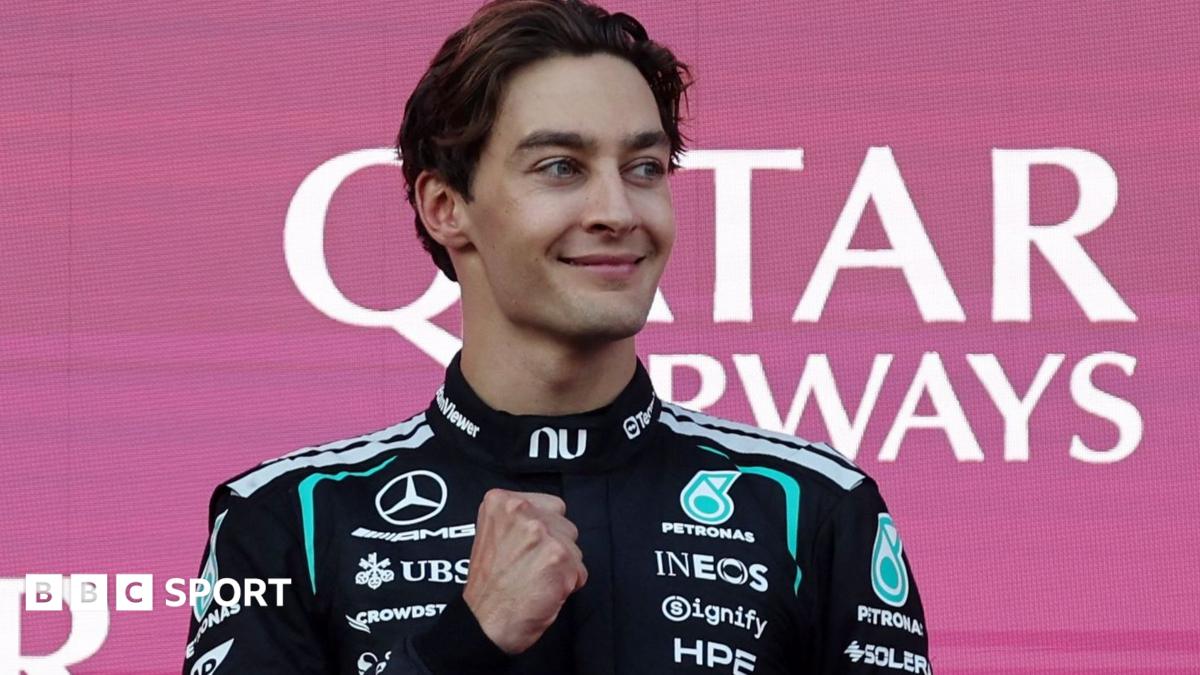 Mercedes' George Russell crosses the finish line with Red Bull's Max Verstappen just behind to win the Azerbaijan Grand Prix