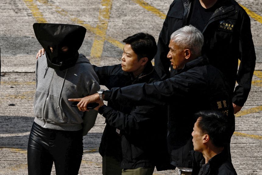 A suspect involved in the murder of model Abby Choi is seen at a police station after being transferred from mainland China in Hong Kong, on March 7, 2023.