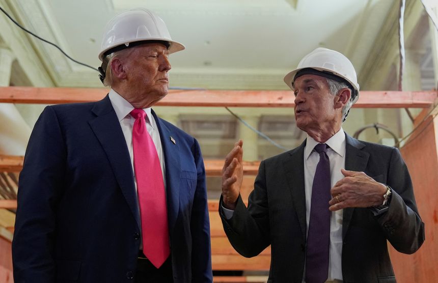 President Donald Trump and then-Federal Reserve Chair Jerome Powell speak during a tour of the Federal Reserve Board building in Washington, DC, on July 24, 2025.