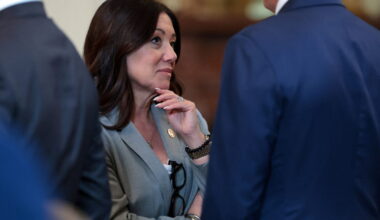 U.S. Labor Secretary Chavez-DeRemer speaks with fellow cabinet members before an event at the White House in Washington