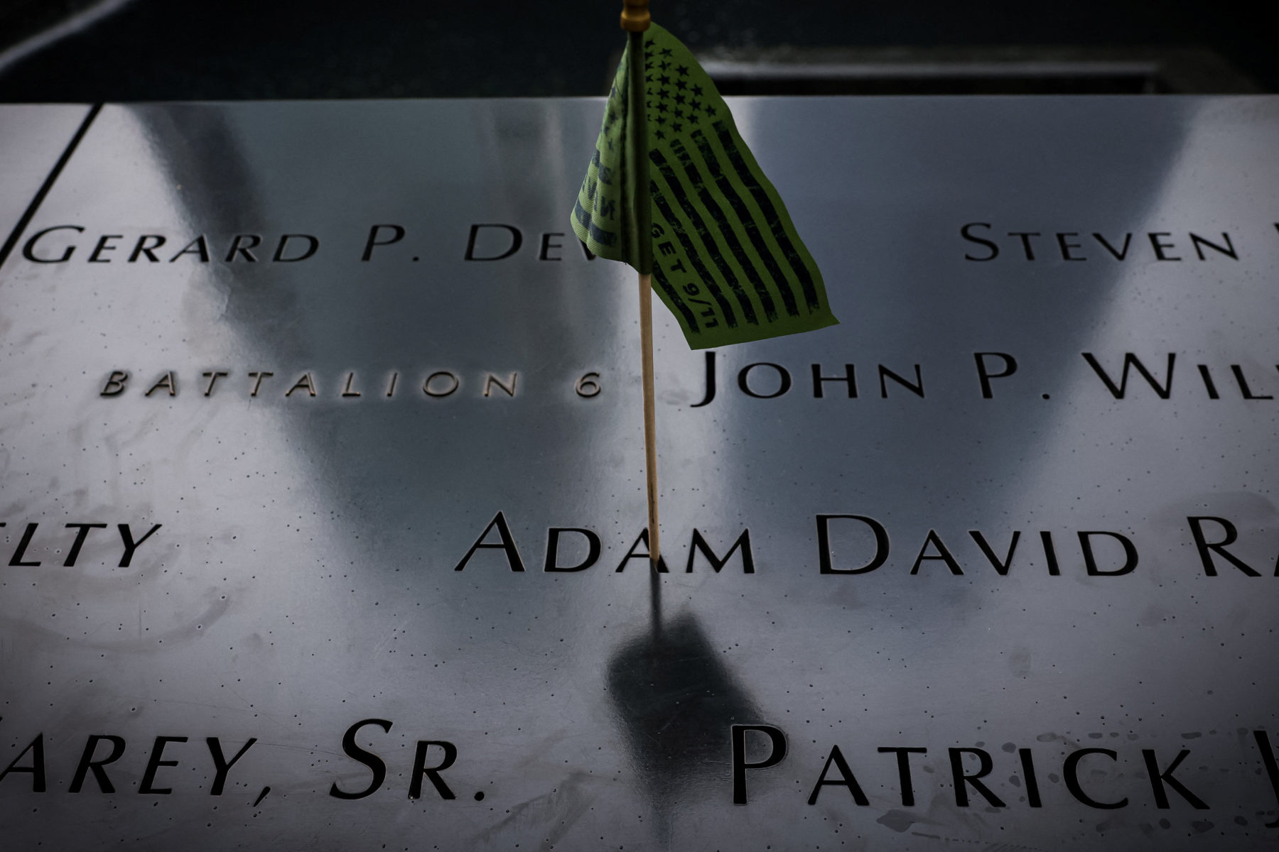 People attend the 9/11 Memorial & Museum ahead of 25th anniversary of the September 11, 2001 attacks on the World Trad...