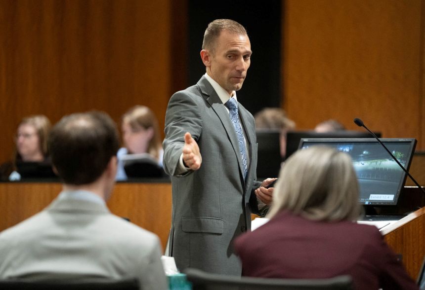 Deputy Utah County Attorney Ryan McBride points to Tyler Robinson as he begins his closing arguments Tuesday in the preliminary hearing for Robinson, the Utah man accused of fatally shooting Charlie Kirk, at the 4th District Court in Provo, Utah.