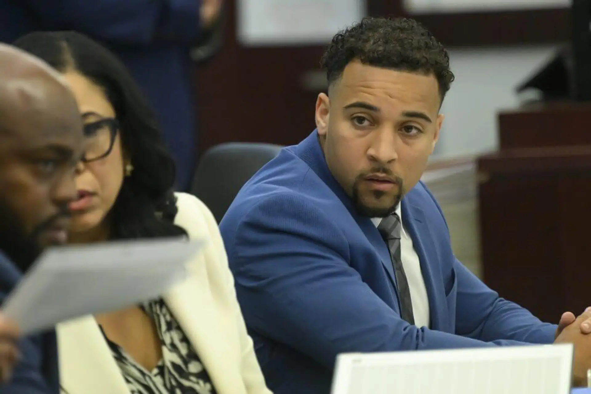 Blaise Taylor listens to attorneys during his trial for the murder of Jade Benning.