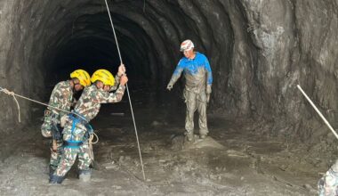 Two men rescued from flood-stricken Nepali power plant where scores trapped