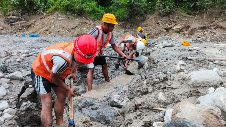 Nepal army soldiers work during a search and rescue operation outside a tunnel near the Hydropower Project sites in Rasuwa district, Nepal, in this handout obtained on September 2.