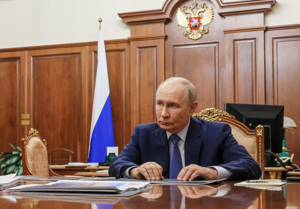 Russian President Putin attends a meeting with head of Tver region Korolyov in Moscow