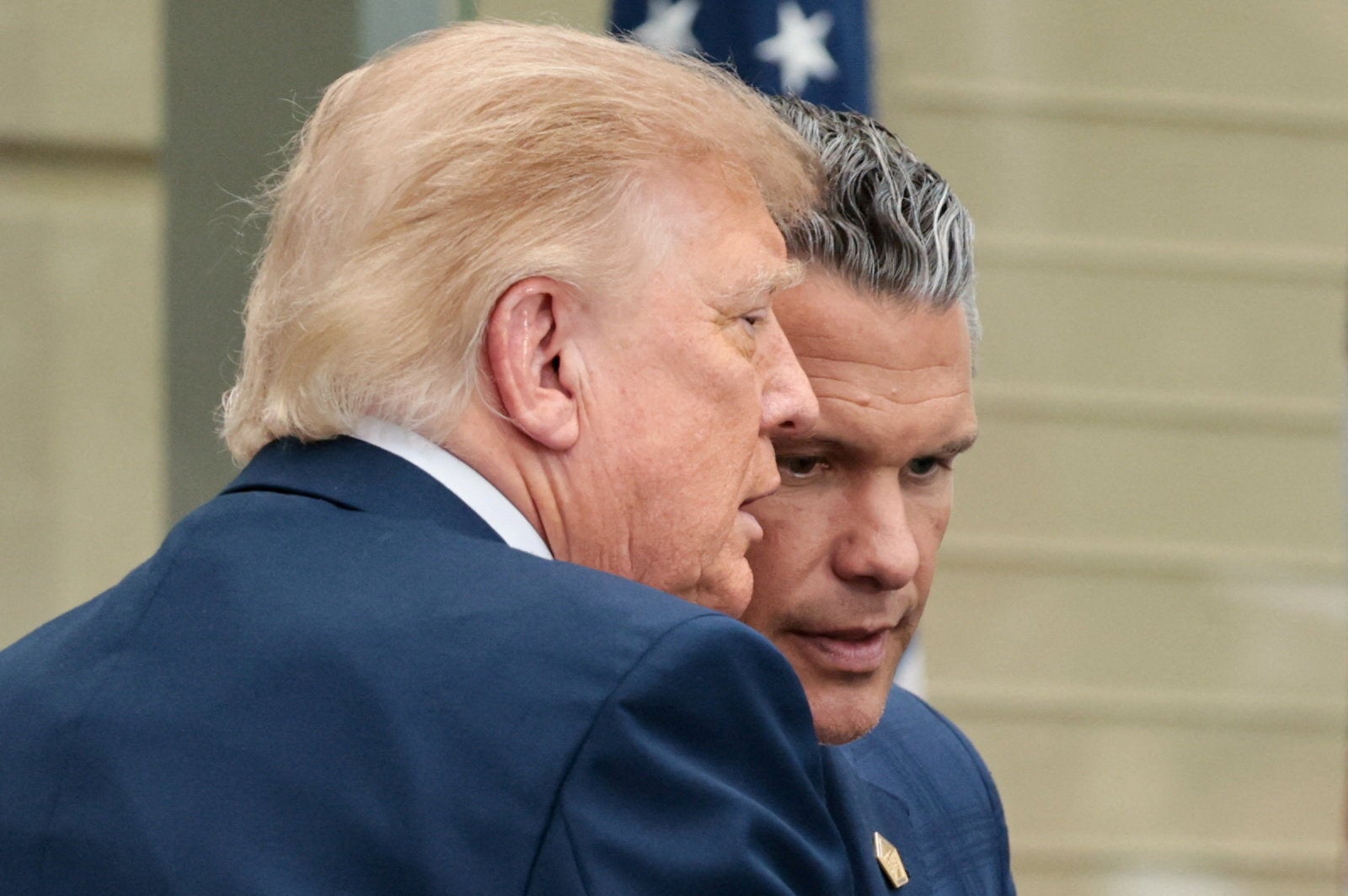 Trump greets Hegseth during an observance ceremony marking the 25th anniversary of the Sept. 11, 2001 attack on the Pentagon