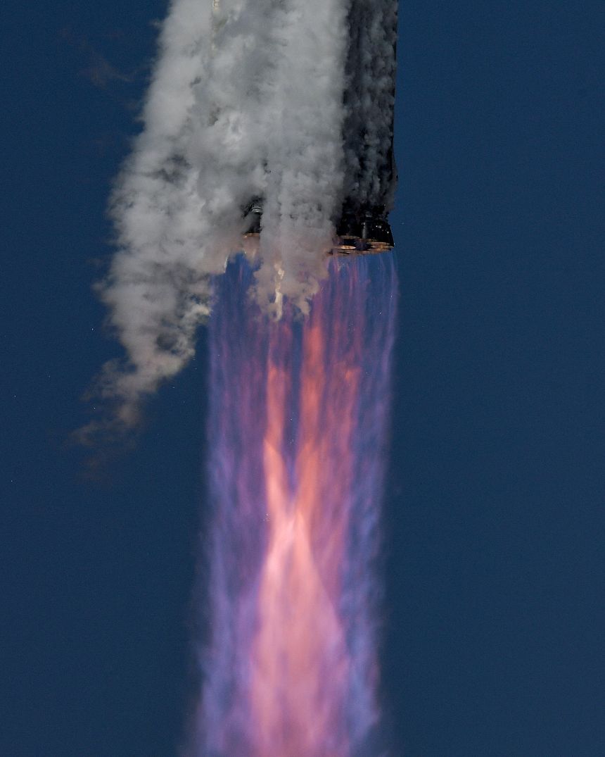 Starship's Super Heavy booster is seen during its 13th test flight from the SpaceX launch complex in Starbase, Texas, in July.
