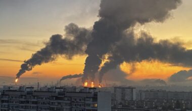 Plumes of smoke rise from fires (centre) at an oil refinery following what the authorities say is a Ukrainian drone strike...