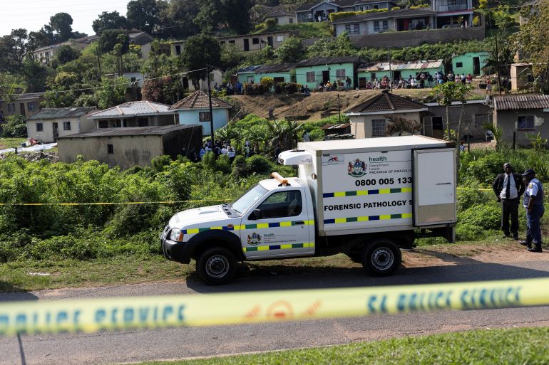 A forensic vehicle parked near the scene of the shooting in the township of KwaMakhutha near Durban [Reuters]