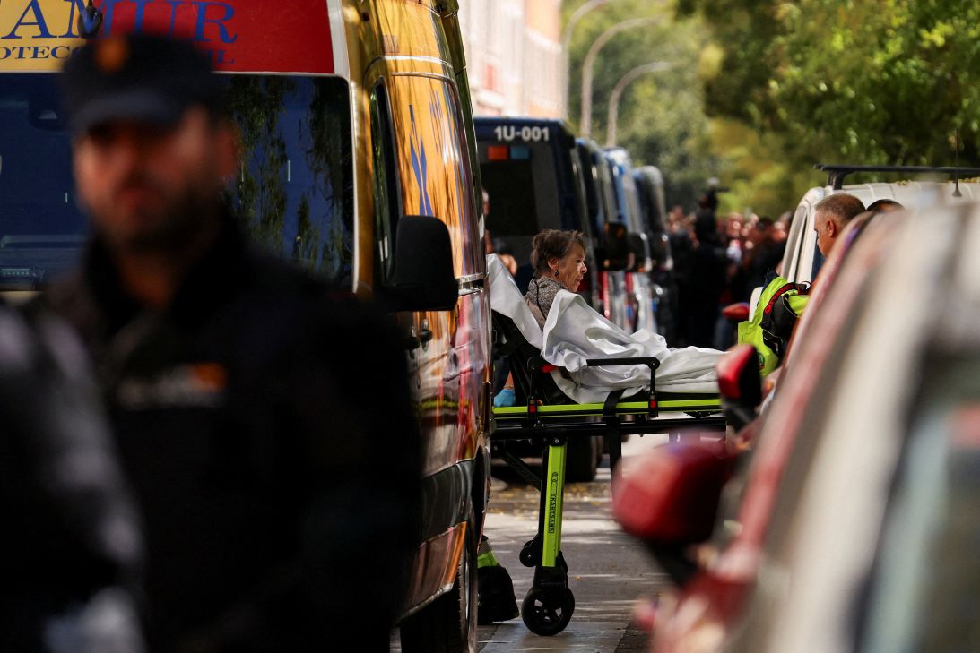 Maricarmen Abascal, 87, is transported on a stretcher to an ambulance, after she was evicted from her home in Madrid, Spain, on September 23. Abascal had lived for more than seven decades after the apartment was acquired by an investment fund that sought a steep increase in her rent, despite efforts by housing activists to broker an alternative arrangement.