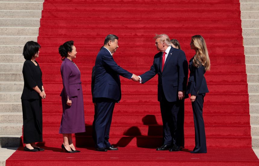US President Donald Trump and Chinese President Xi Jinping shake hands alongside US first lady Melania Trump and Chinese President Xi Jinping's wife Peng Liyuan, after visiting the National Archives Museum in Washington, D.C., US, September 25, 2026.