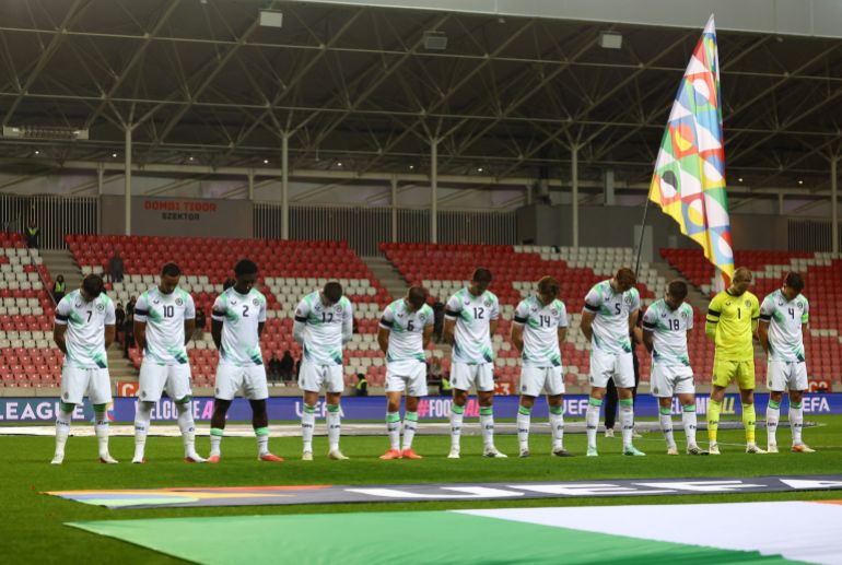 Soccer Football - Nations League - Group B3 - Israel v Republic of Ireland - Nagyerdei Stadion, Debrecen, Hungary - September 27, 2026 Republic of Ireland players wearing black armbands in recognition of all lives lost in the Gaza conflict bow their heads and during the Israel national anthem before the match REUTERS/Bernadett Szabo