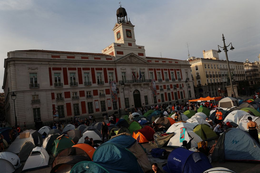 Demonstrators sleep and hang around tents after setting up a camp at Puerta del Sol square, on September 27, in protest against Spain's housing crisis after the forceful eviction Maricamen Abascal from her apartment in Madrid, Spain.
