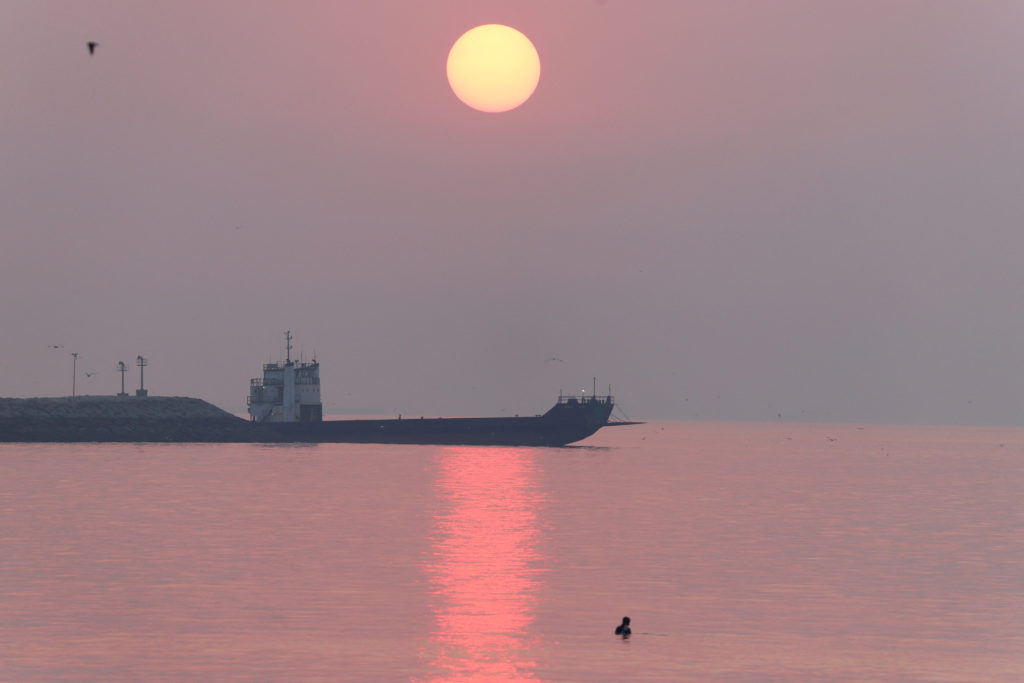 Vessels in the Strait of Hormuz near the beach of Bandar Abbas