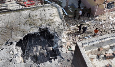 People inspect damage and debris at a building that Iranian media said was hit by a U.S. strike while a wedding celebration was taking place there, in Kuhestak, southern Iran, Wednesday, Sept. 2, 2026.