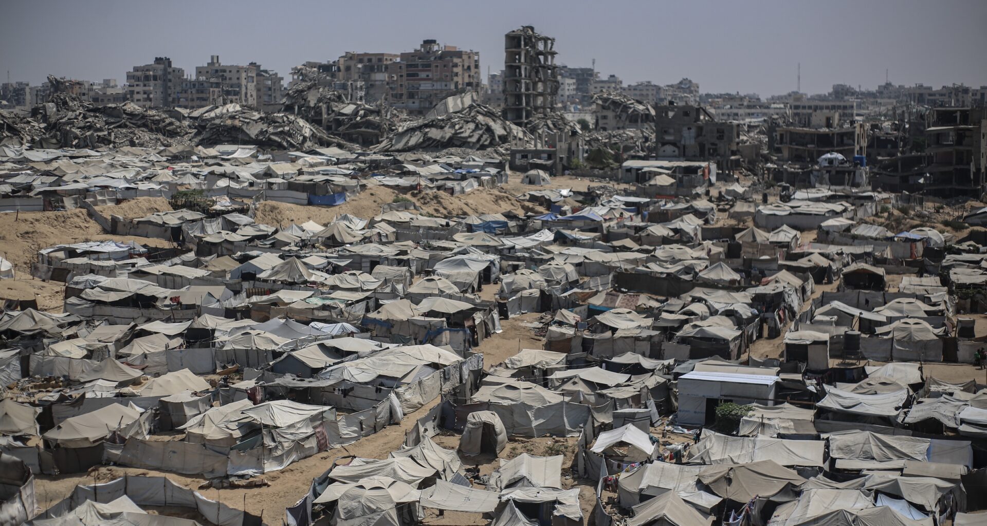 A view of Palestinian displacement camps amid widespread destruction in Gaza City on August 29, 2026 in Gaza City, Gaza.