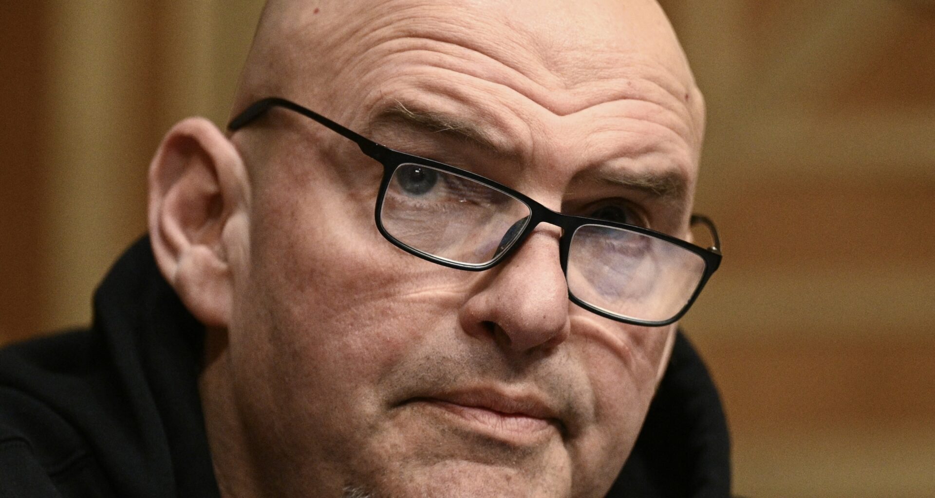 Sen. John Fetterman talks during a Senate Homeland Security and Governmental Affairs Committee hearing amid scrutiny over immigration enforcement on February 12, 2026.