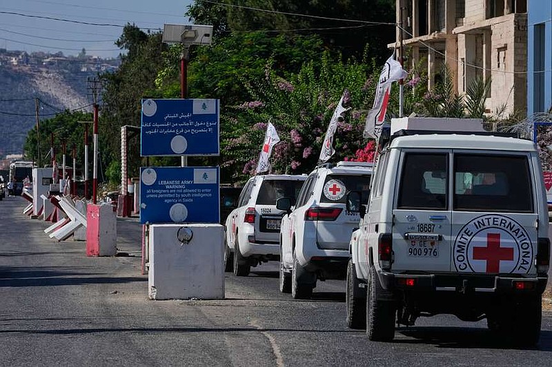 A Red Cross convoy passes a Lebanese checkpoint near the border with Israel in the southern village of Mansouri, Lebanon, Friday, Sept. 4, 2026. (AP Photo/Mohammed Zaatari) CORRECTION: A Red Cross convoy, instead of U.N. peacekeeper convoy