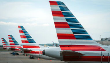 Man duct-taped to plane seat after hurling slurs and attacking other passenger, witness says