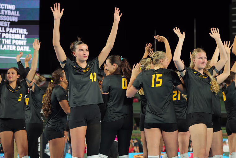 Missouri's Grace O'Reilly acknowledges the after a match against Nebraska was cancelled.