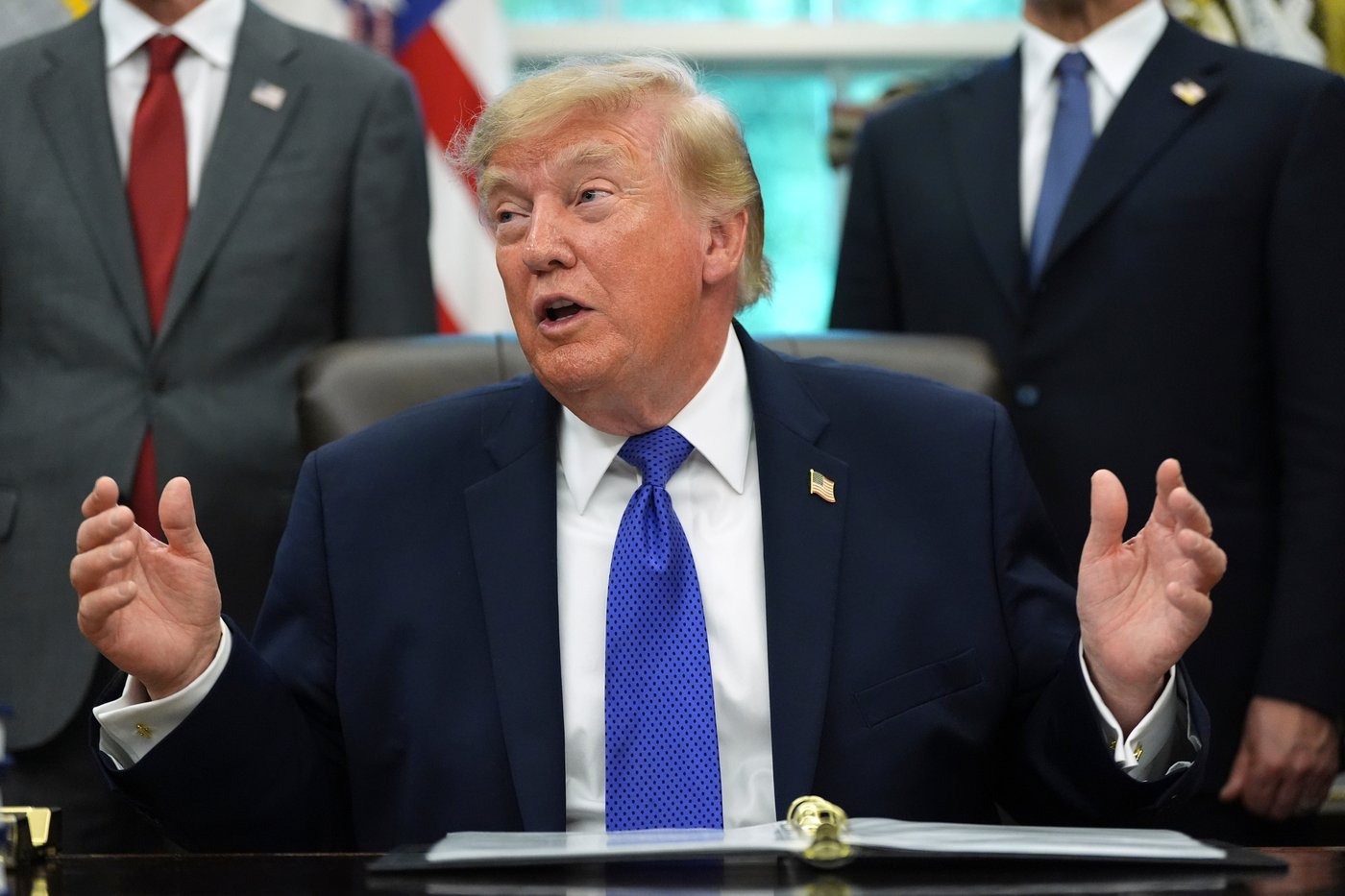 Trump's import bans on Canadian liquor, whey, motorcycles take effect