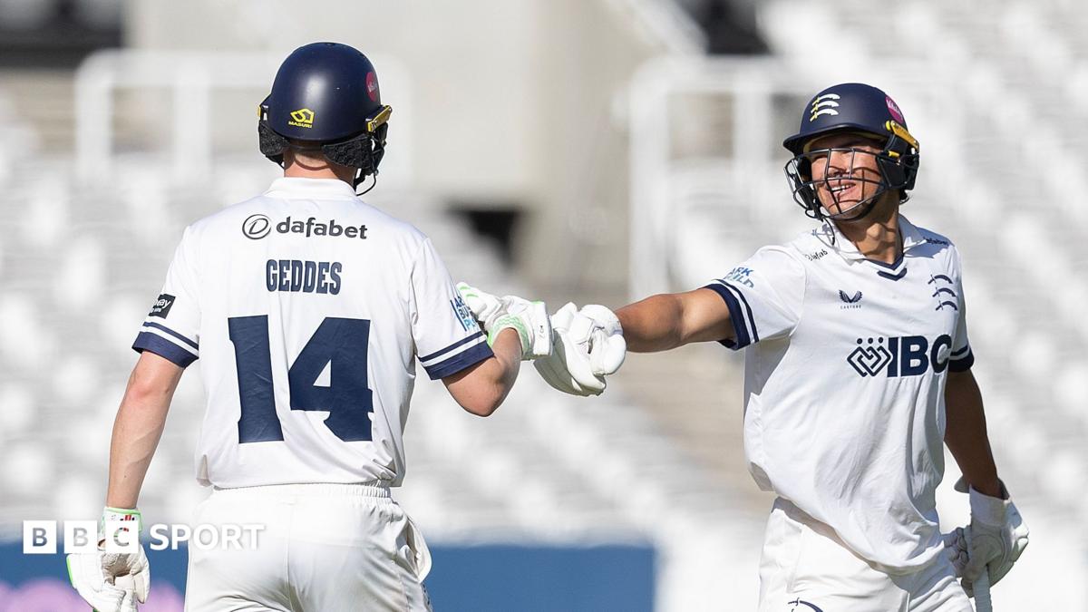 Caleb Falconer, of Middlesex, congratulates team-mate Ben Geddeson his fifty during Middlesex CCC vs Northamptonshire CCC