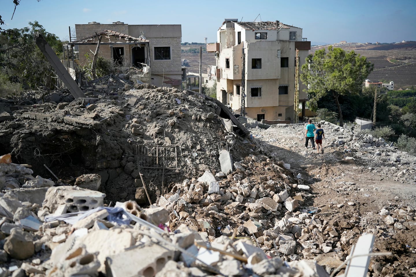 Residents inspect the destruction the morning after a night airstrike by the Israeli military that targeted the southern Lebanese village of Mayfadoun on Sept. 5, 2026. Israeli strikes in southern and eastern Lebanon late on Sept. 4, 2026, killed at least three people and injured 23, the Lebanese health ministry said. The ministry said in a statement that strikes hit five locations in the southern Tyr and Nabatieh regions and the Bekaa region in the east. The strikes came despite a truce between Israel and the Iran-backed Hezbollah militant group.