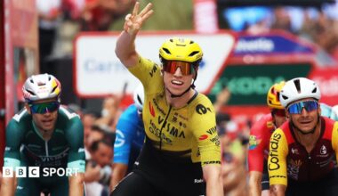 Matthew Brennan  holds up three finger while he crossed the line in first place on stage 11 of the Vuelta a Espana