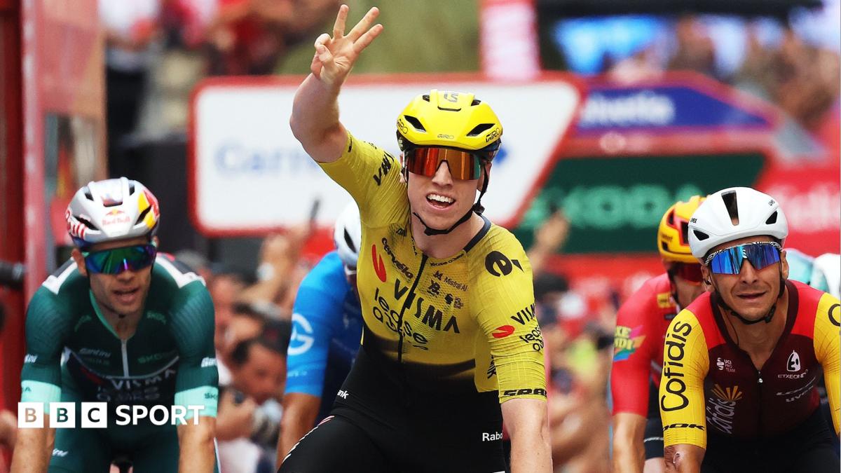 Matthew Brennan  holds up three finger while he crossed the line in first place on stage 11 of the Vuelta a Espana