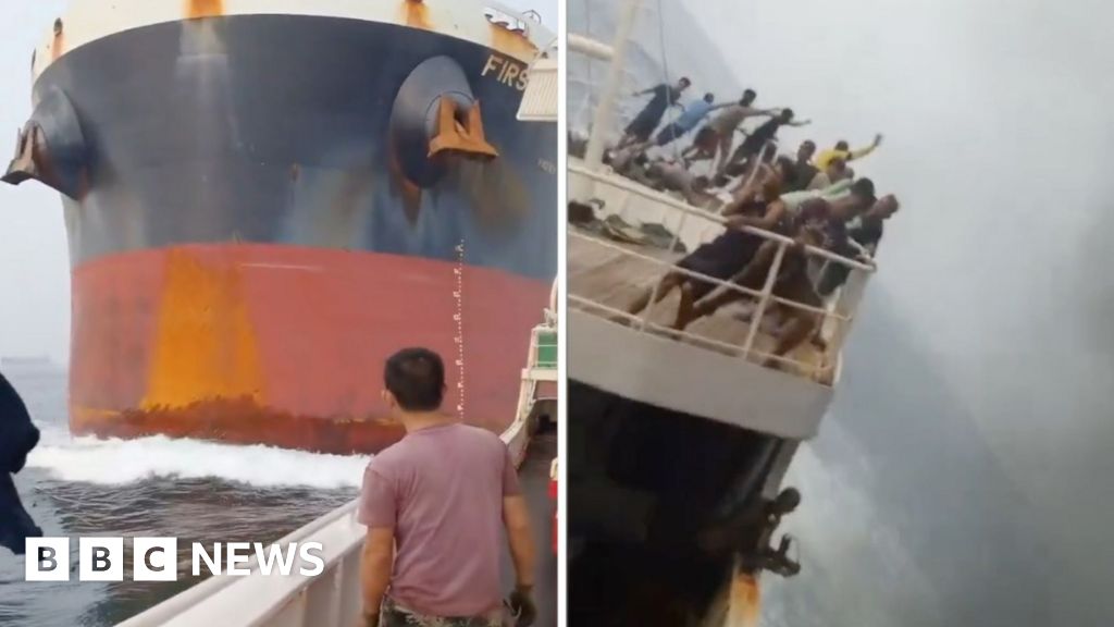 Dramatic moment a cargo ship crashes into another vessel